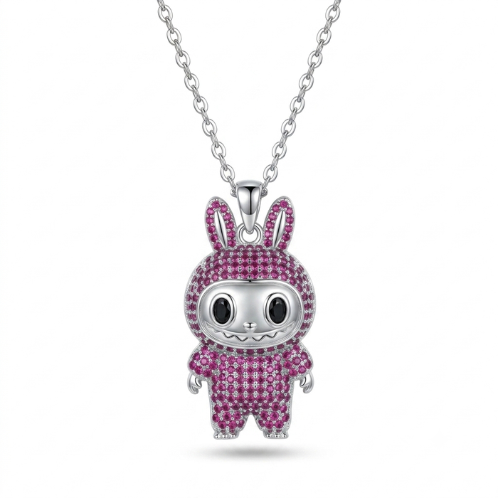 A silver bunny pendant necklace on a delicate silver chain, featuring a silver bunny body encrusted with sparkling pink gemstones, set against a clean white background.