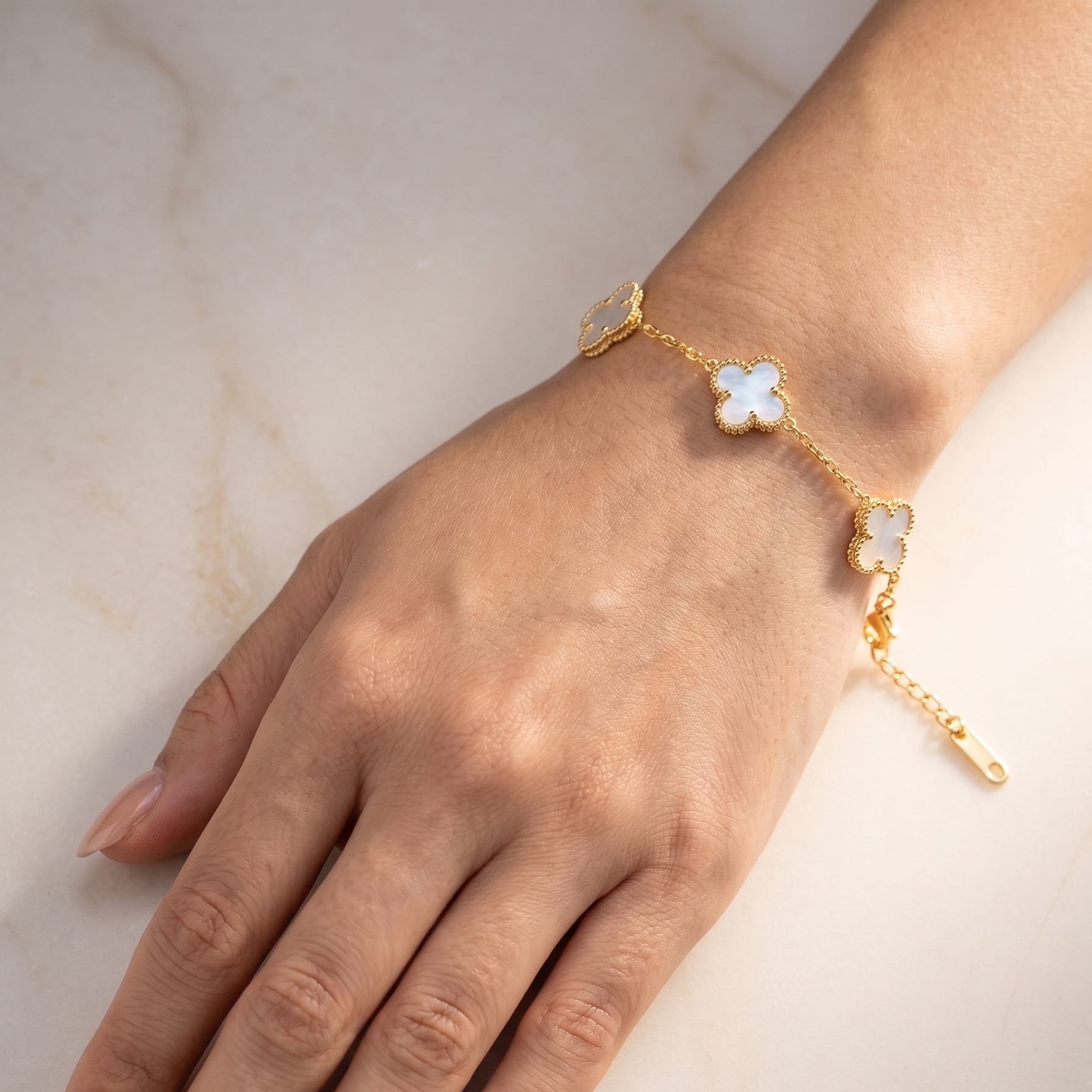 white enamel mother of pearl bracelet on wrist