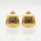 A pair of gold clutch-style earrings with a crown-shaped top and a vertically ribbed, textured body