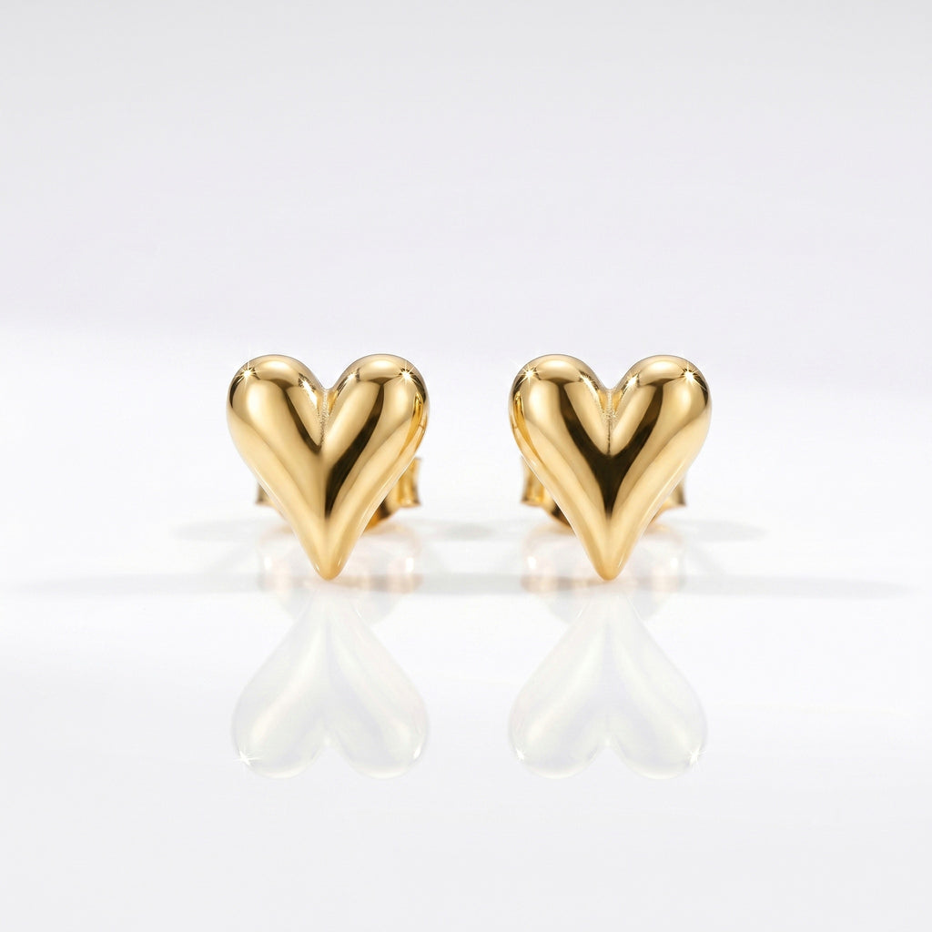 polished yellow gold heart-shaped stud earrings