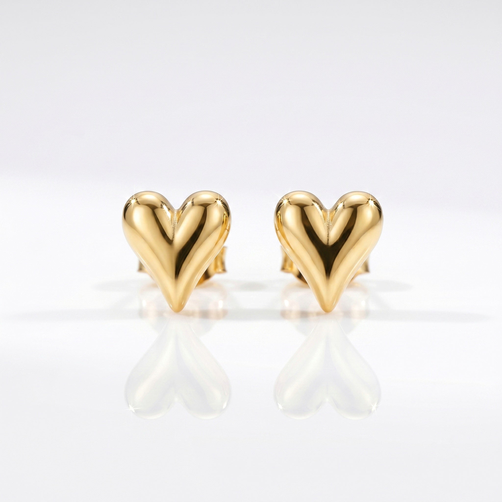 polished yellow gold heart-shaped stud earrings