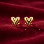 Gold heart-shaped earrings