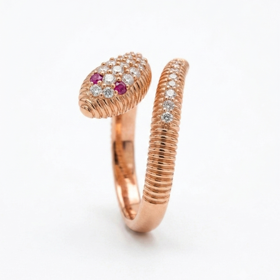 Rose gold snake-shaped ring with gemstones and red eyes