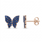 A pair of butterfly stud earrings in rose gold with pavé blue gemstones, shown from the front and side profile on a white background.