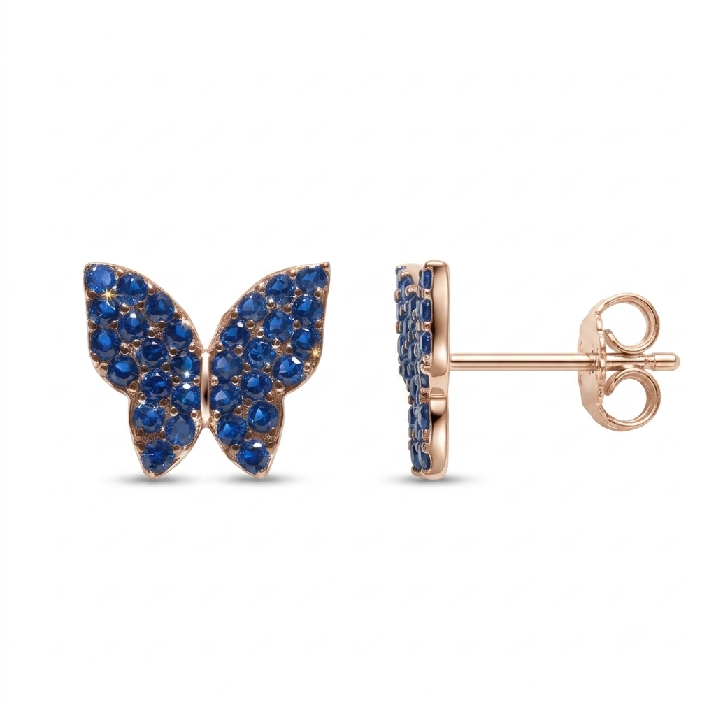 A pair of butterfly stud earrings in rose gold with pavé blue gemstones, shown from the front and side profile on a white background.