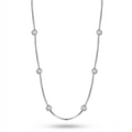A silver-toned chain necklace featuring seven evenly spaced, round bezel-set clear stones, displayed against a clean white background.