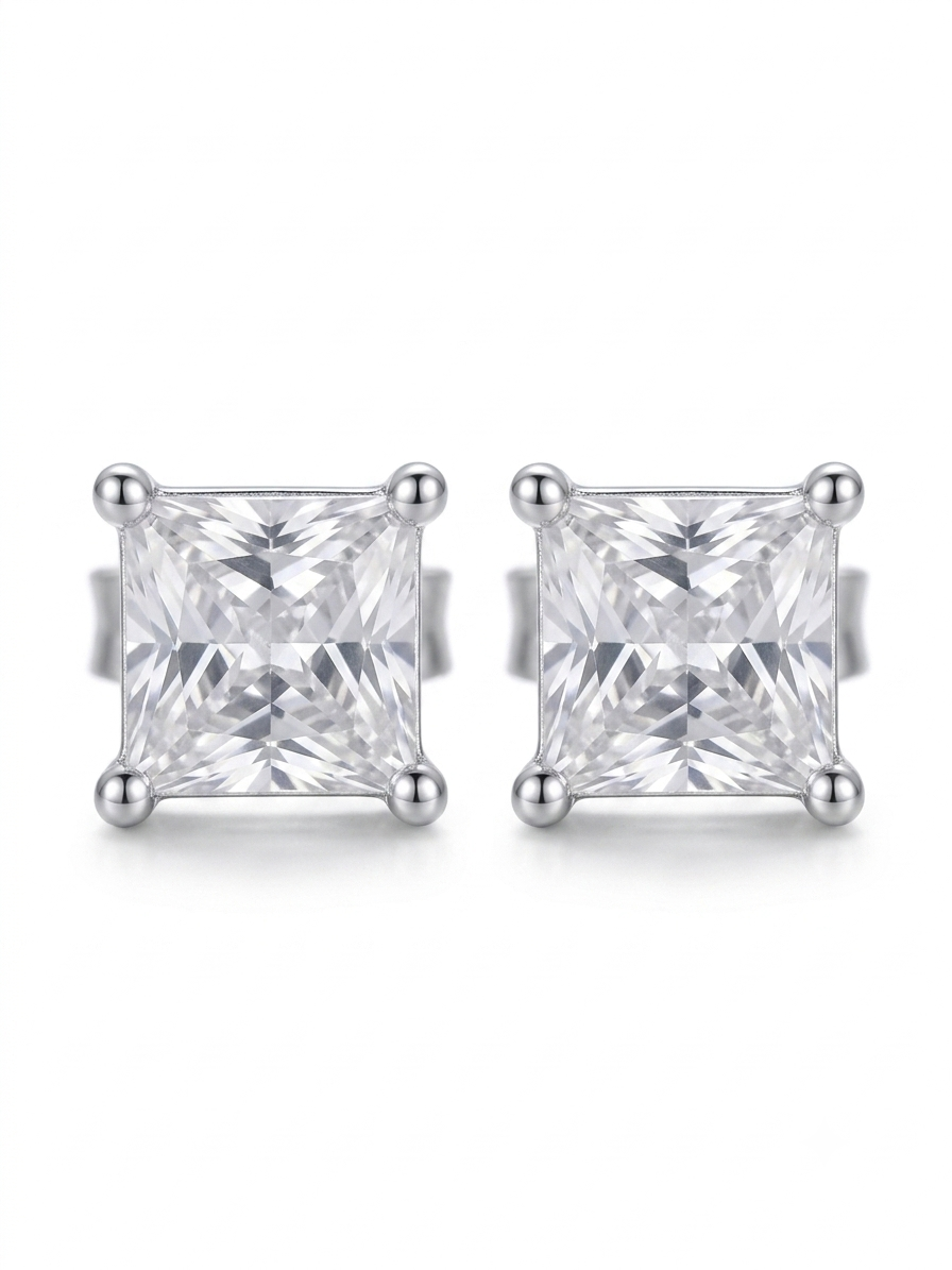 A pair of princess-cut diamond stud earrings in a silver four-prong setting, displayed on a clean white background.