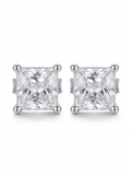 A pair of princess-cut diamond stud earrings in a silver four-prong setting, displayed on a clean white background.