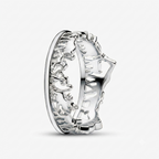 A sterling silver ring featuring an intricate relief design of a classical bust on the band, shown from a side profile against a light gray background.