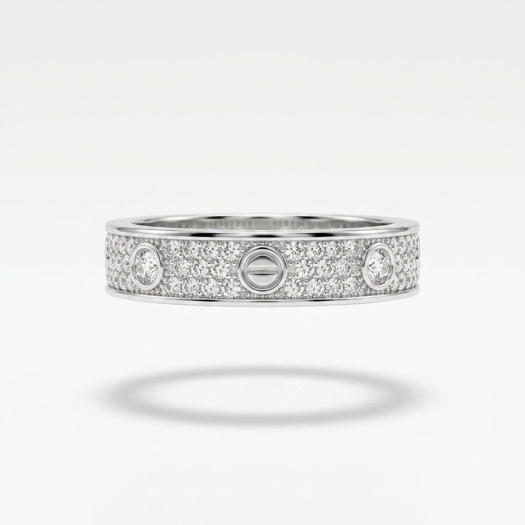 A silver-tone ring with pavé-set clear stones and three oval-cut center stones, shown floating on a light gray background with a soft shadow below.