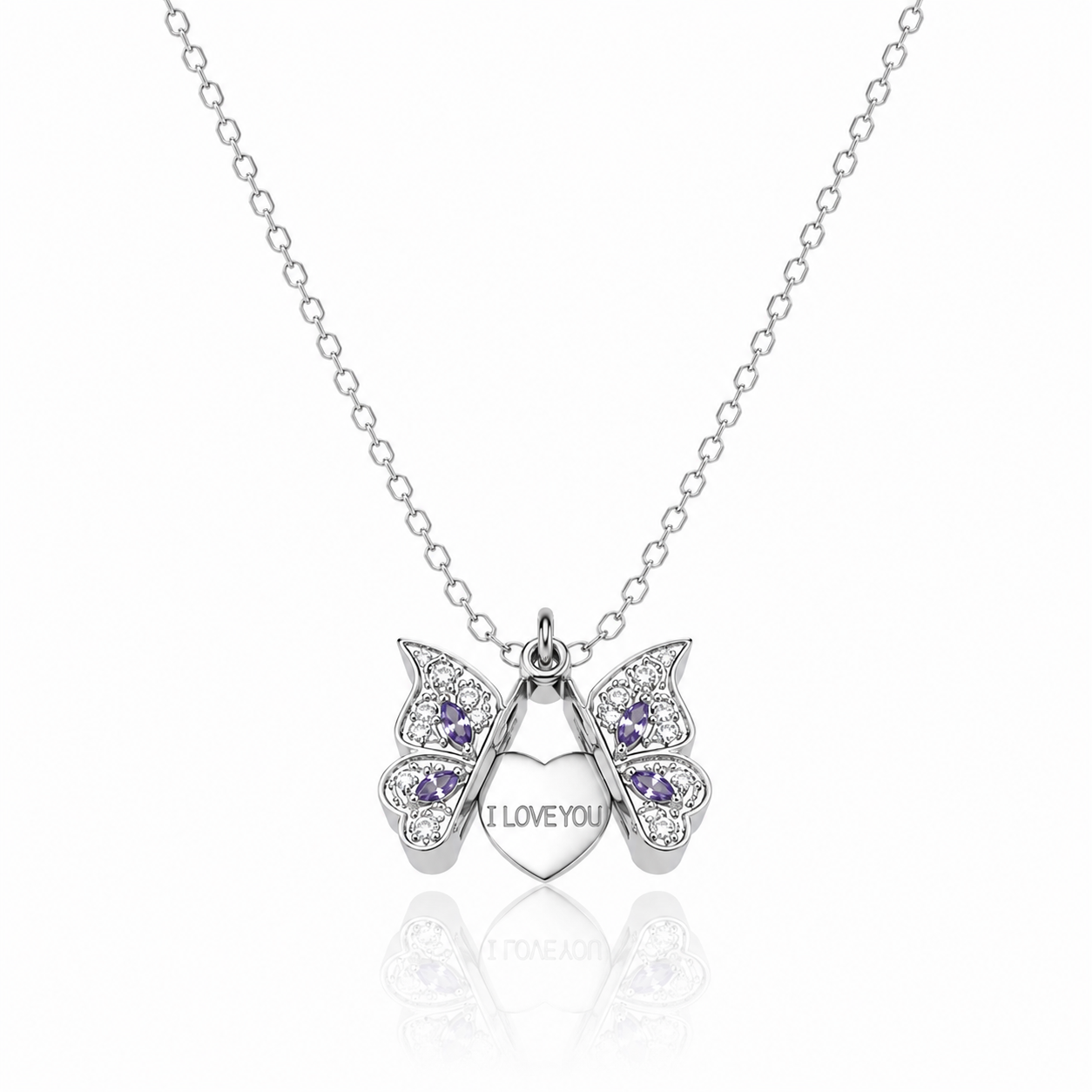 A silver butterfly pendant necklace with purple gemstone accents and a central heart charm engraved with 'I LOVE YOU', suspended on a delicate silver chain against a white background.