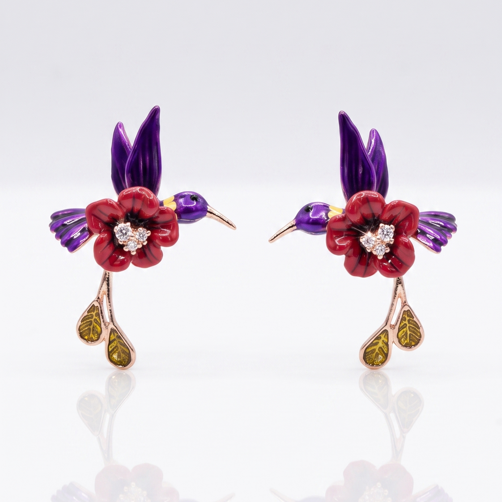 Pair of floral earrings with red flowers, purple leaves, and gold accents on a white background