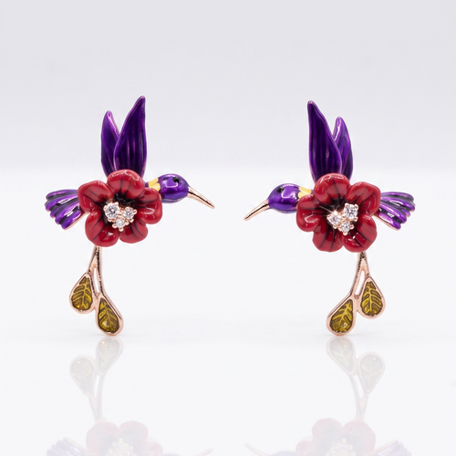 Pair of floral earrings with red flowers, purple leaves, and gold accents on a white background