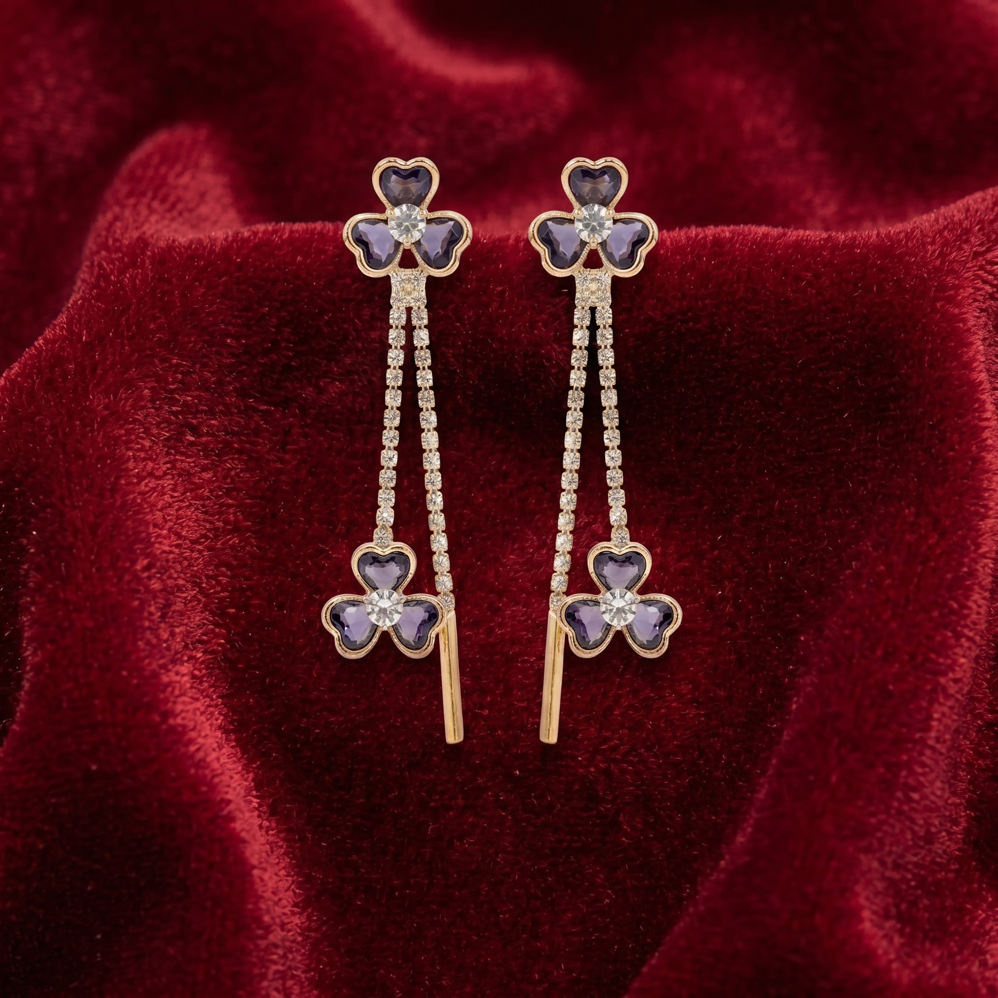 earrings with purple clover-shaped stones with diamonds and gold drop