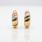 Pair of gold hoop earrings with colorful stripes