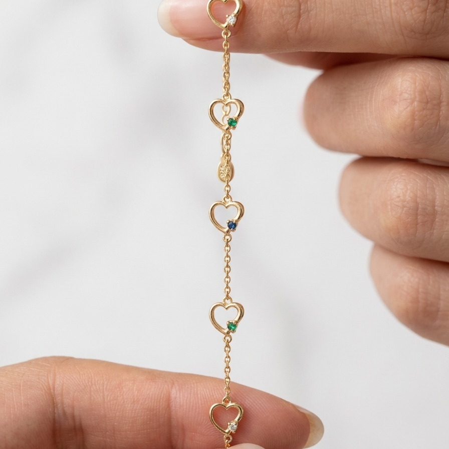 Heart shaped Gold bracelet with stones