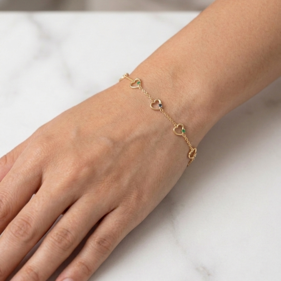 Heart shaped Gold bracelet with stones