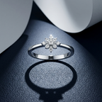 Silver ring with a snowflake-shaped diamond