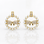 Pair of earrings with pearl and bow design