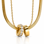 Gold necklace with two interlocking rings on a white background