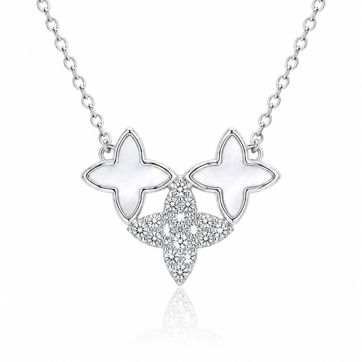 Butterfly-shaped necklace with white stones on a white background