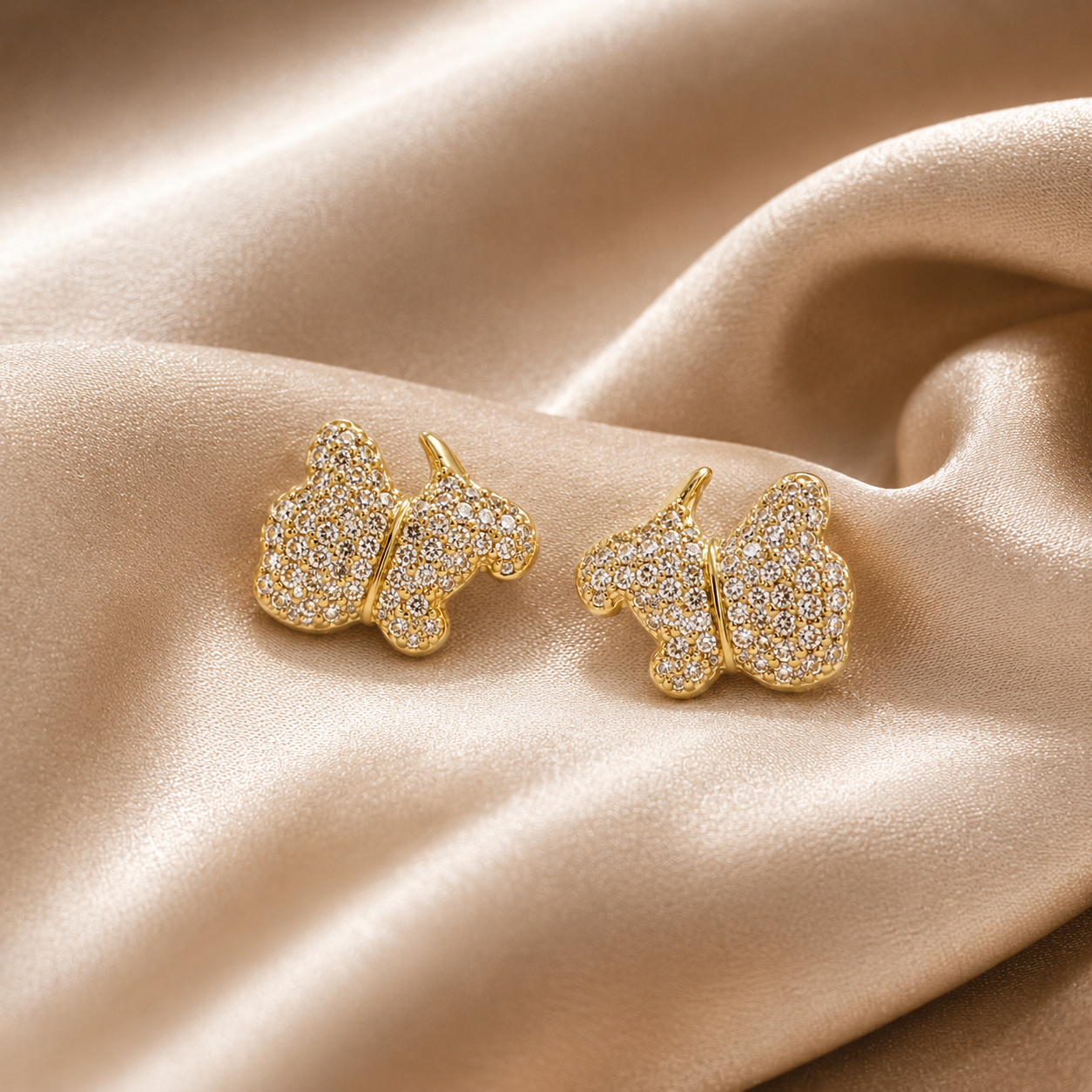 Green teardrop earrings with gold hooks