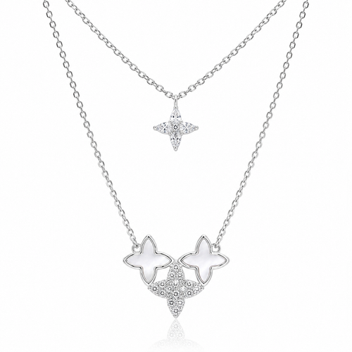 Star-shaped silver necklace with white stones on a white background