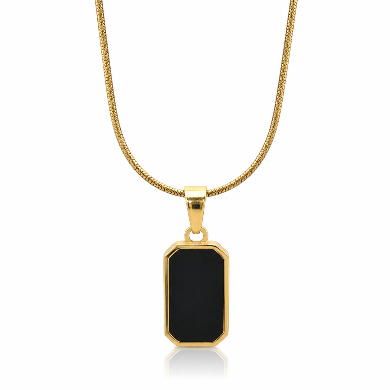 Gold necklace with a black pendant