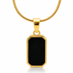 Gold pendant with a black stone