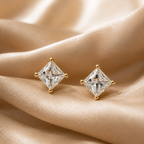 diamond stud earrings with gold prongs