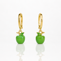 Gold hoop earrings with green apple charms