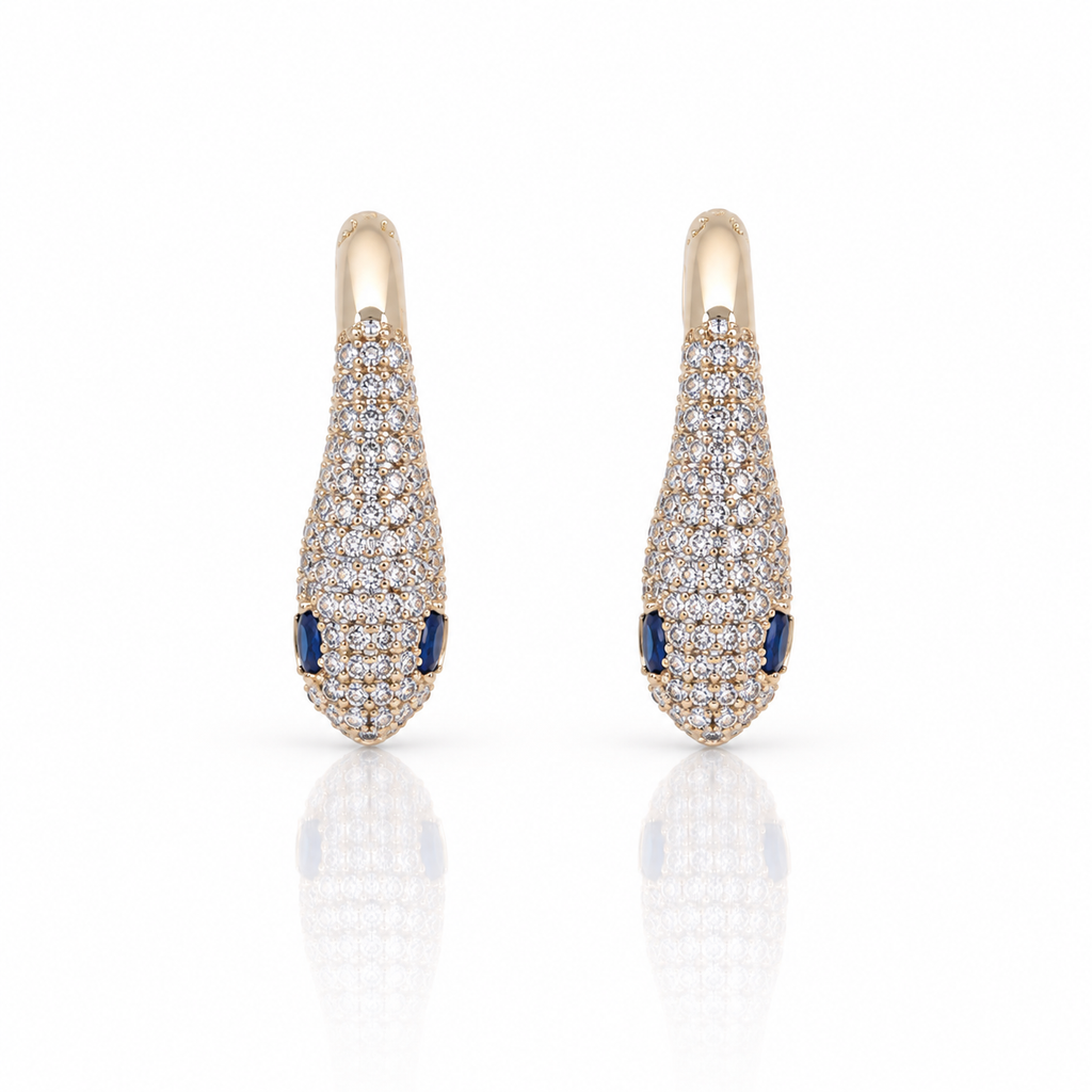 snake rose gold earrings with diamonds and blue stone eyes