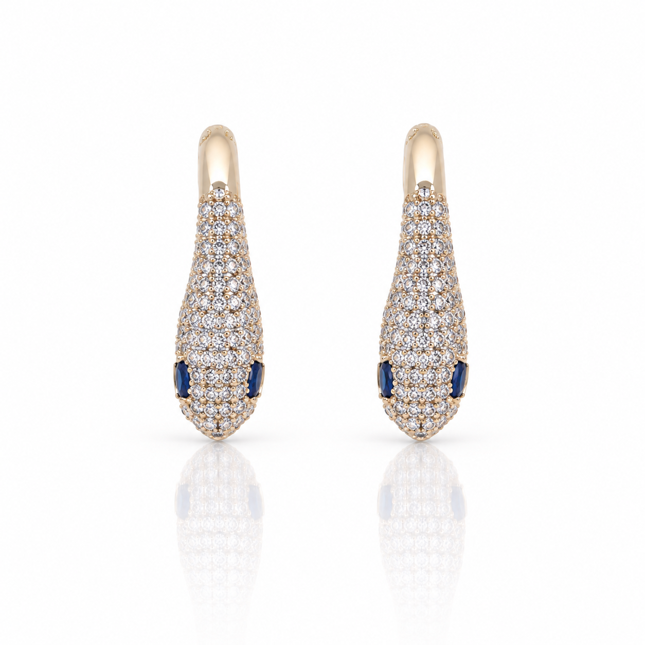 snake rose gold earrings with diamonds and blue stone eyes