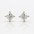 diamond stud earrings with gold prongs