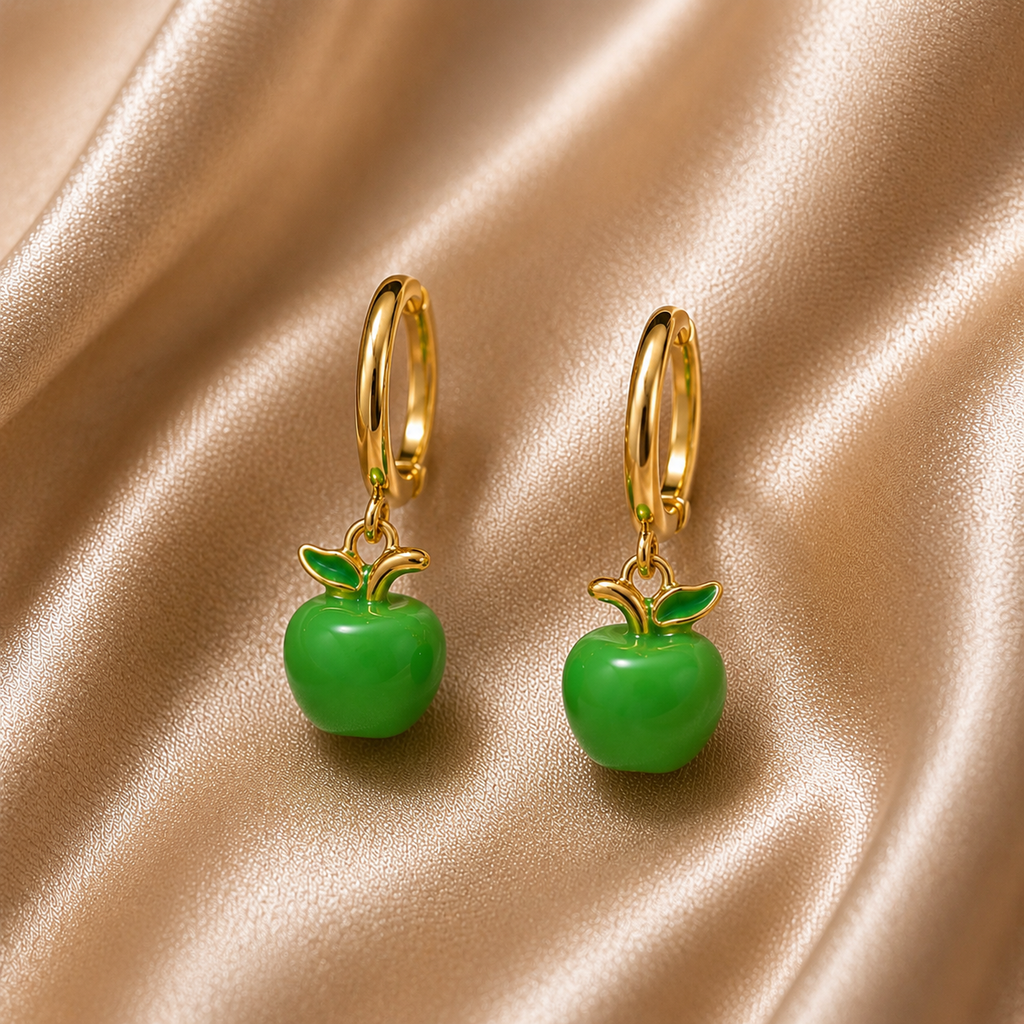 Gold hoop earrings with green apple charms